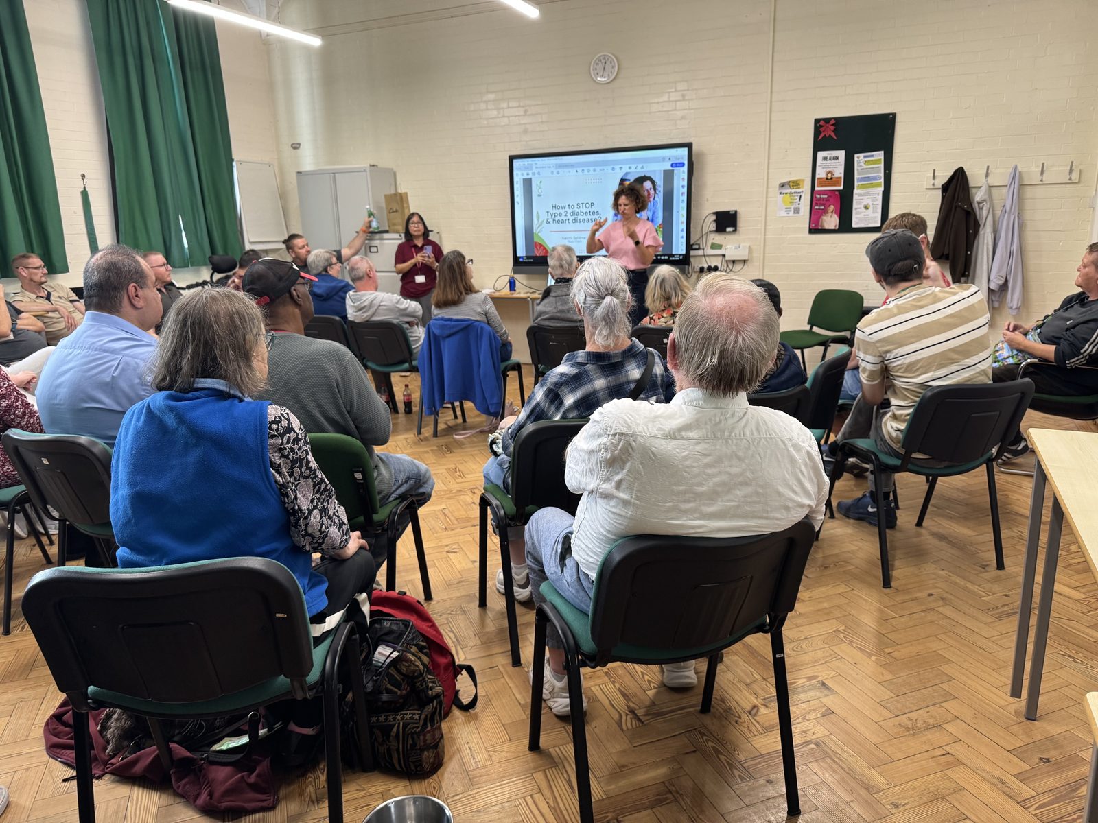 A full room at the Peterborough Deaf Drop-In watching Naomi Goldman present her healthy eating talk