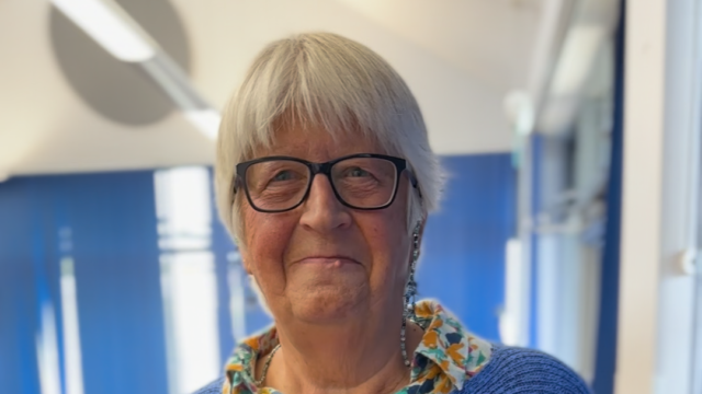 Caroline Bickerton, trustee of Cambridgeshire Deaf Association, smiling